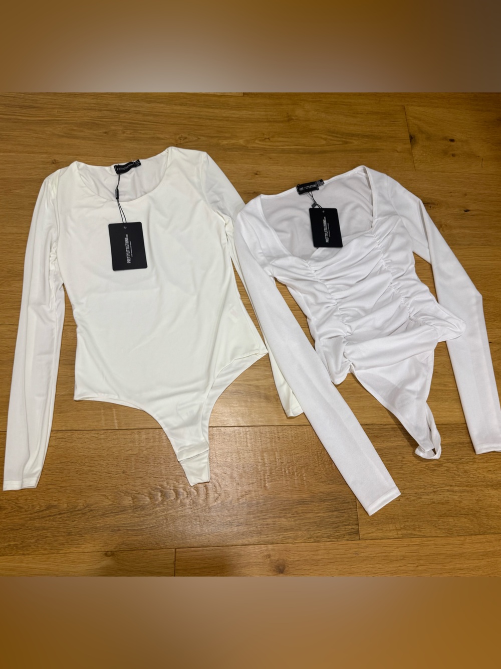 2-pack PrettyLittleThing white long sleeve bodysuits